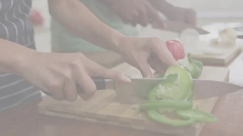 First knife slice starting close cooking pair cutting pepper and tomato prepping Stock Footage 333369227
