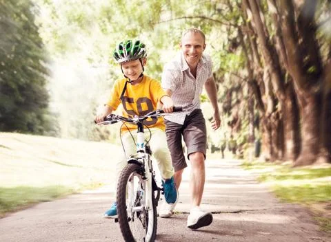 First lessons bicycle riding Stock Photos