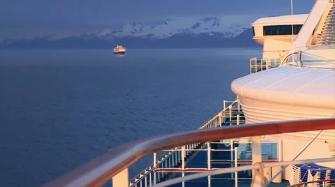 First light of day illuminates two cruise ships against a blue predawn sky. Stock Footage 39589659