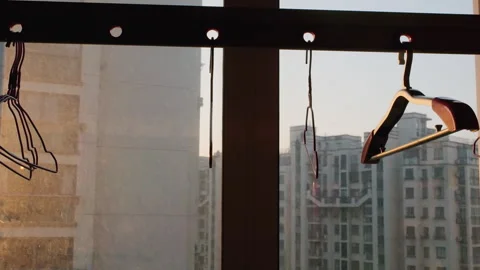 First light of the morning, empty hangers on the balcony, apartment 스톡 동영상 300163735