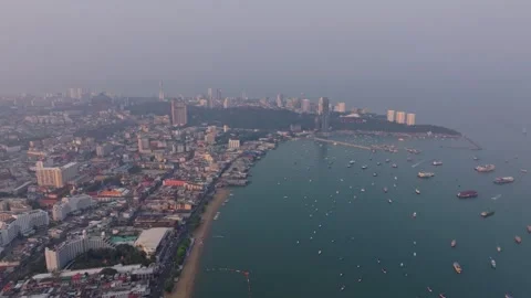 First light touches the oceanfront skyline of Pattaya, Thailand Stock Footage 310055207