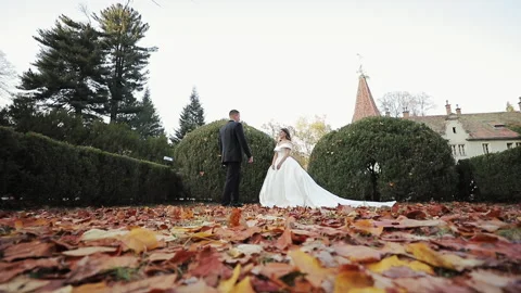 First look of young wedding couple, meeting before old castle, bride and groom. Stock Footage 310369580