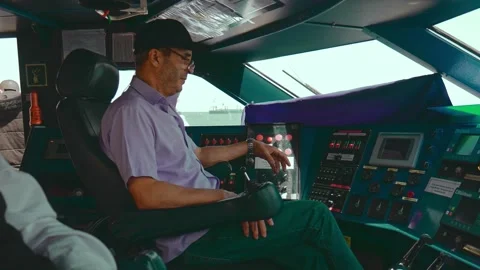 First Mate Seated and Observing the Ocean Stockbeeldmateriaal 278167754