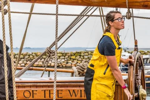 The first mate at the steering wheel Stock Photos
