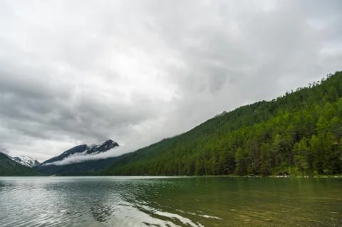 The first Multi-Mountain with dark clouds. Altai Mountain Stock Photos