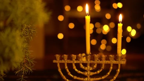 The First Night of Hanukkah. One light in the menorah Stock Footage 120496587