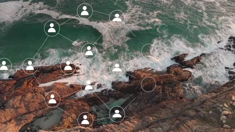 First node appearing lower-left, user icons spreading, connecting over aerial Video stock 334242311