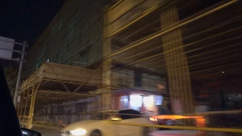 First person camera of vehicle passing Shanghai residential building Stock Footage 124594908