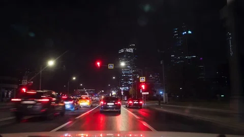 First Person Car Driver View at Night City Streets. Moscow, Russia. 4K Timelapse Stock Footage 97429943
