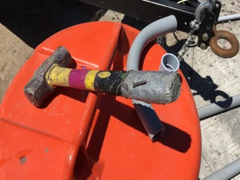 First Person of Construction Worker Picking Up Hammer 스톡 동영상 76247940