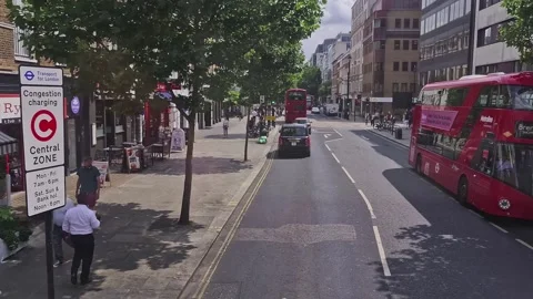 First person front person view (fpv) of London red double decker in London Stock Footage 314974222