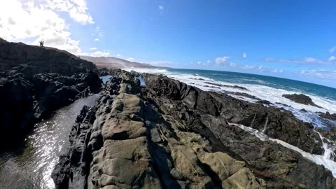 First person perspective of hiking through the arid desert landscape and rocky Video stock 328957008