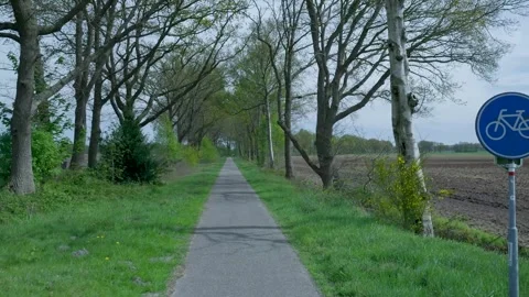 First person perspective riding along a rural bike path 스톡 동영상 336594692