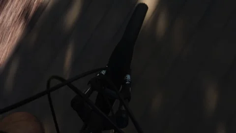 First-person perspective shot of a bicycle wheel  Stock Footage 274756970