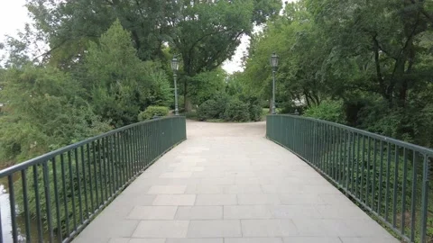 First person perspective of someone walking across a bridge Stock Footage 158059630