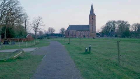 First person perspective walking on cobblestone path to church 库存影片 335027463