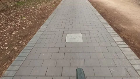 First person point of view of a cyclist riding along a bike lane Stock Footage 222786440