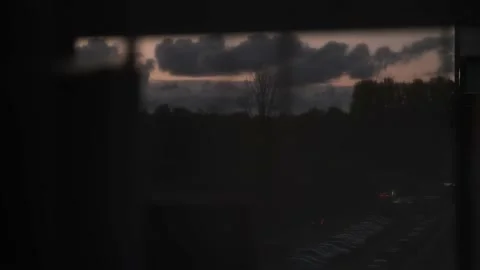 First person point of view looking outside through window glass on dusk sky. 動画素材 160335913