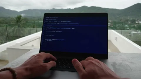 First-person portrait programmer developer programmer freelancer writes code at Stock Footage 194526351
