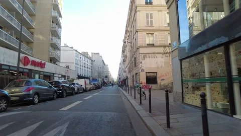First person POV forward motion driving and bike riding in the streets of Paris Stock Footage 221487908