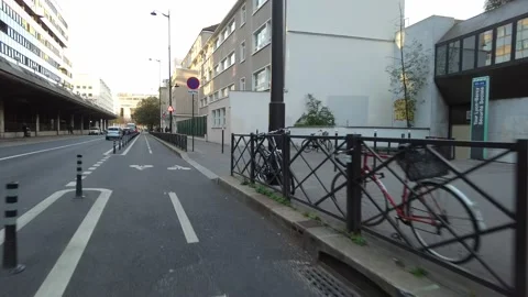 First person POV forward motion driving and bike riding in the streets of Paris Stock Footage 221492727