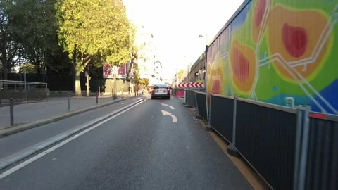 First person POV forward motion driving and bike riding in the streets of Paris Stock Footage 221492998