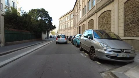 First person POV forward motion driving and bike riding in the streets of Paris Stock Footage 221493040