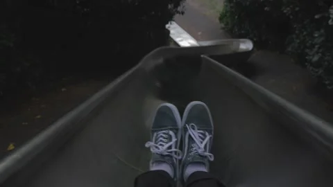 First Person POV Going Down Playground Slide in Park Fun Lifestyle Adventure Vidéo 336704053