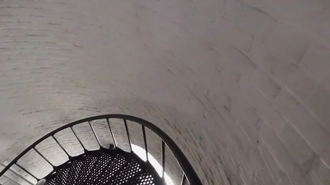 First person POV walking down the steps of the Saint Augustine Lighthouse Stock Footage 106760623