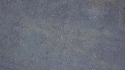 From the first person slowly fall on the gray asphalt Stock Footage 130725072