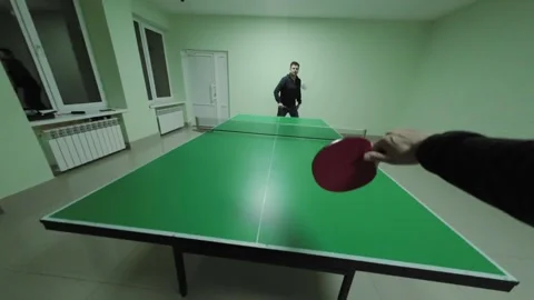 First-Person Table Tennis Experience: Real-Time POV Gameplay at Indoor Facili Video stock 299912853