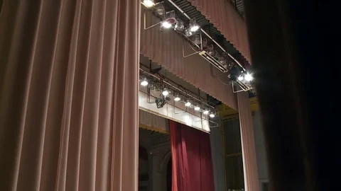 First-person video shooting, the actor in the theater goes on stage from behind Stock Footage 80717983