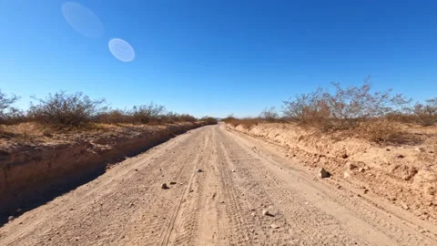 First person view of dirt road in the desert hyperlapse shot from front Stock Footage 147249461