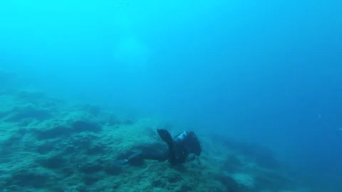First person view, diver check his dive computer underwater. Stock Footage 134059770