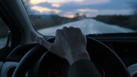 First person view of driver holding steering wheel. Stock Footage 152011069