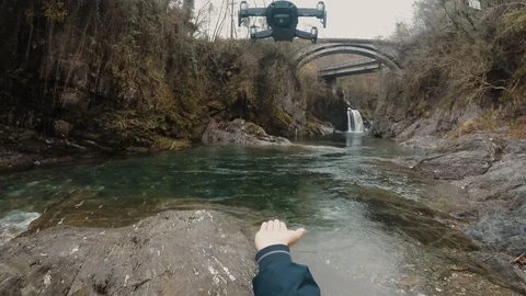 First-person view of the drone landing on a man's hand Stock Footage 119815519