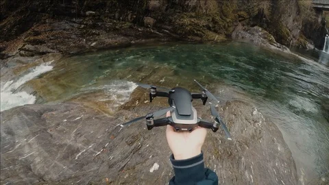 First-person view of a drone take-off from a man's hand Stock Footage 119817120