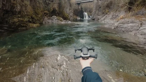 First-person view of a drone take-off from a man's hand Stock Footage 119817377
