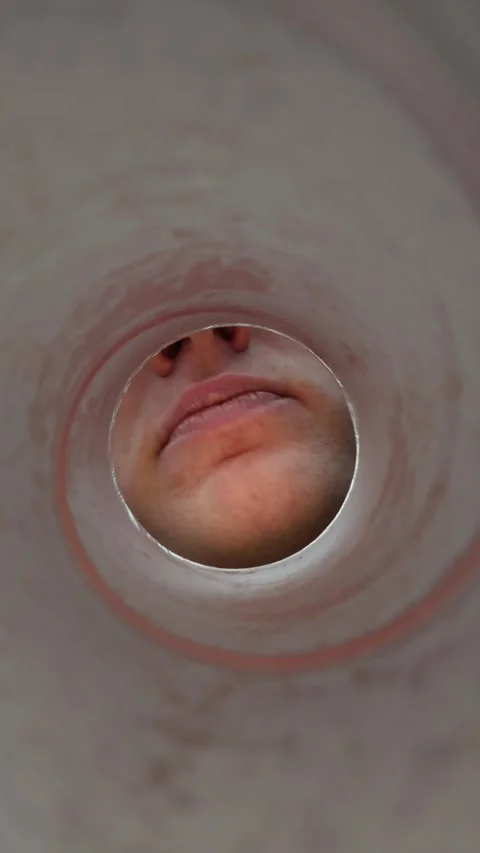 First person view of eating a chip from a snack tube Stock Footage 337160331