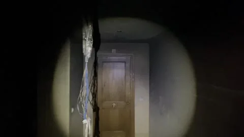 First-person view exploring a house devastated by fire Video stock 320815629