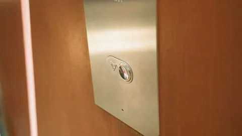 First-Person View of Finger Pressing Elevator Button Stock Footage 280713847