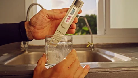 First Person View Of Hand Filling Glass With Tap Water Under Kitchen Faucet Befo Stock Footage 330637670