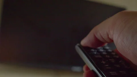 First-person view of a hand using a remote control Stock Footage 335648312