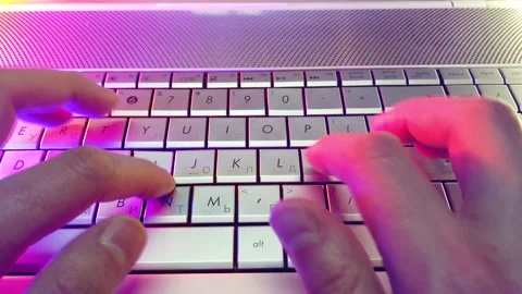 First-person view, hands type text on laptop keyboard Stock Footage 144541254