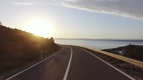 First Person View Highway Driving Time Lapse at Sunrise Stock Footage 320098563