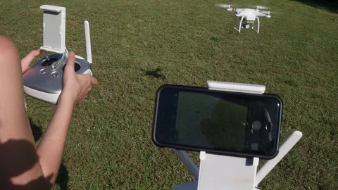 First Person View Of A Man And Woman Piloting A Drone Together Stock Footage 80293268