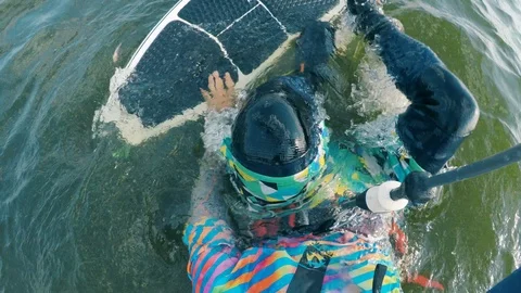 First-person view of a man during windsurfing Stock Footage 124299593