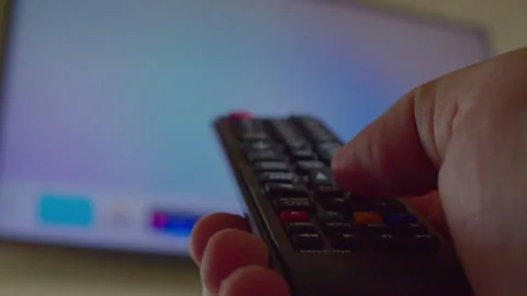 First-person view of a man's hand using a remote control Stock Footage 335648313