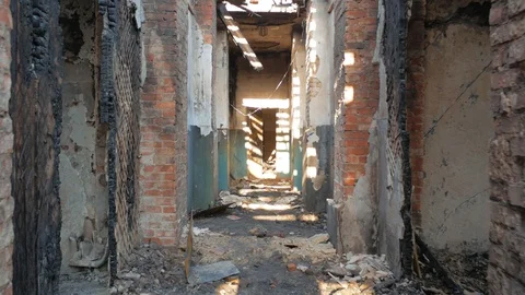 First person view of moving forward in corridor of ruined abandoned building Stock Footage 90224030