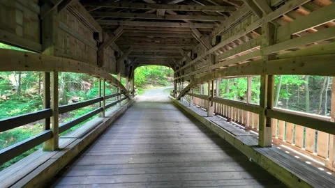 First person view perspective walking across an old fashioned wooden covere.. Stock-Footage 329663173